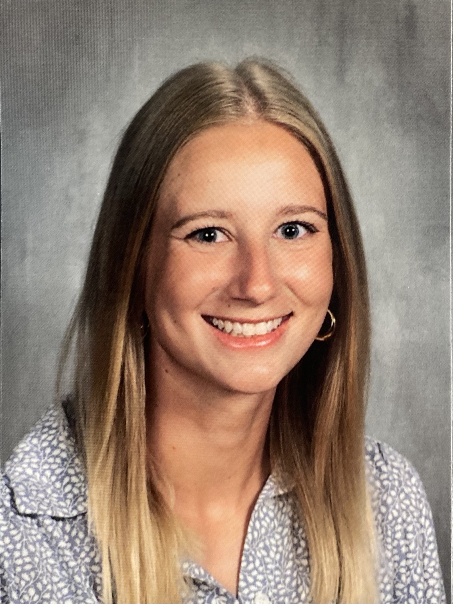 Kayla, the artist behind Ruth Evelyn Paints